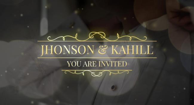 Golden wedding invitation opener with particle effects and glowing orbs